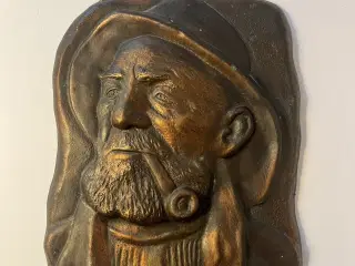 Retro bronze fisker relief