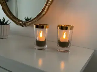 2 fine elegante lysestager med guldkant fra Ilum.