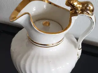 Gammel chokoladekande med guld