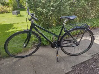 Centurion Challenger cykel med 7 gear og 2 nøgler.