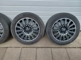 Saab alufælge med sommerdæk.