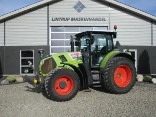 CLAAS Arion 620 C-matic med frontlift og frontPTO, affjedret foraksel og affjedret kabine. Opgraderet til Arion 650