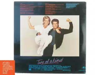 Lp plade john travolta&olivia newton john two of a kind fra Polar Music International (str. 31 x 31 cm)