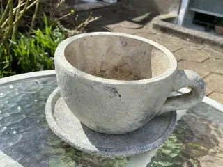 Urtepotteskjuler som kop