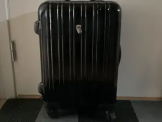 Delsey kabineKuffert i sort med gode gummihjul, ly