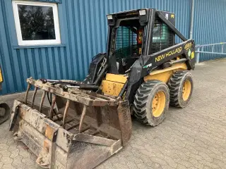 New Holland LX665 MINILÆSSER