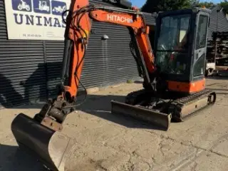 Velkørende gravemaskine