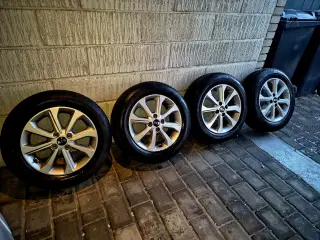 4X100 fælge med 185 65 15 vinterdæk (kia)