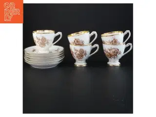 Porcelænskop og underkop med blomstermotiv (str. Ø 13,5 cm)