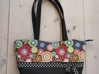 Flot skuldertaske i retro stil