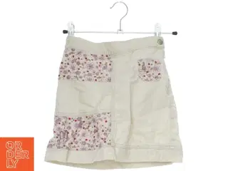 Beige nederdel med blomsterprint fra H&M (str. 122)