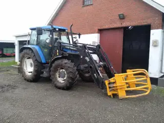 NEW HOLLAND TS 100 med Frontlæsser
