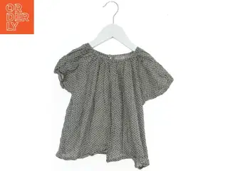 Kortærmet bluse med mønster fra Pomp de Lux (str. 98)