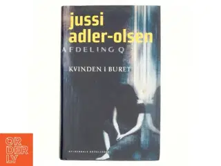 Kvinden i buret : krimi af Jussi Adler-Olsen (Bog)