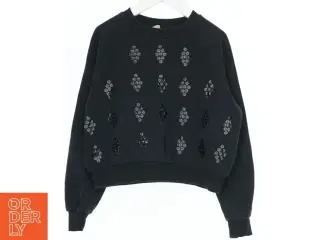 Sort sweatshirt med pailletter fra H&M (str. 140)
