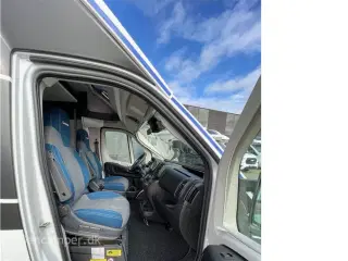 2024 - Chausson X650 Exclusive line   Unik cross-over model! Camper med stor Lounge og siddegruppe, sænkeseng, stor garage, Artic-, Connect-, Tilbehørs- og Safetypakke,