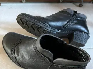 Tyk læder i sort med grå