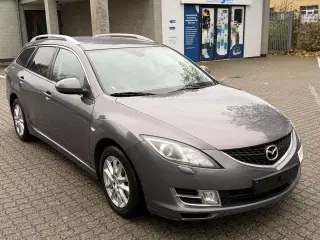 Rummelig Mazda med læderkabine