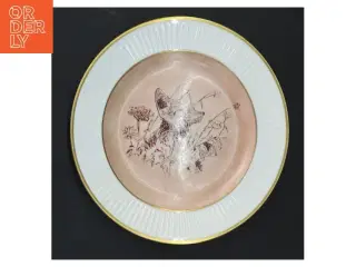 Dekorativ tallerken med hundemotiv fra Royal Copenhagen (str. Ø 17,5 cm)