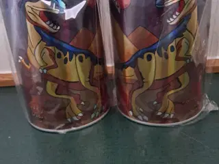 Dinosaurus motiv på sparebøsser