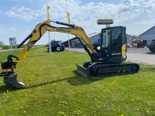 New Holland E70D ring for info og tilbud