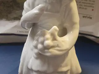 Porcelænsfigur pige der spiser druer