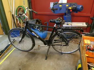 El-cykel PUCH med batteri og lader