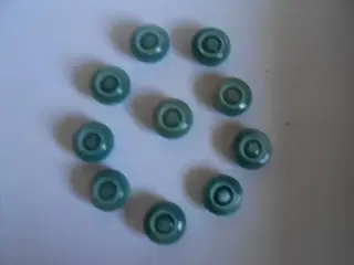 Brug knapper som pynt. 