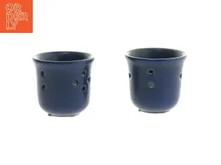 Blå lysestager med huller (str. 6x6 cm)