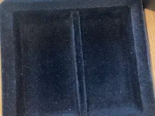 Tesla midterkonsolbakker
