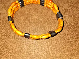Orange armbånd med magneter