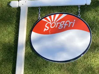 stort reklameskilt med mast