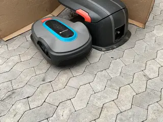 Robot plæneklipper med garage 