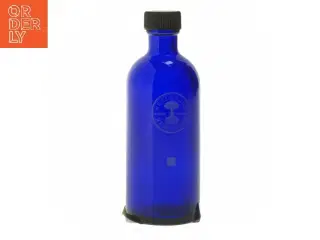 Nilens Jord Blå glasflaske med låg fra Neals Yard (str. 13 cm)