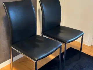 2 spisebordsstole i sort læder/stålben