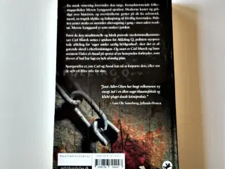 Kvinden i buret. Af Jussi Adler-Olsen