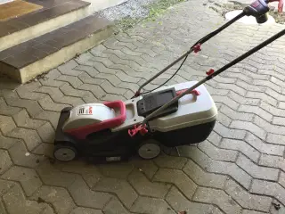 El græsslåmaskine