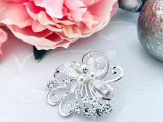 Broche flot dekorativ 