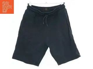 Herreshorts i mørkeblå fra Next (str. 158)