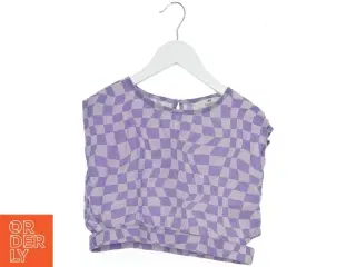 Kortærmet bluse med bølgemønster fra H&M (str. 134)