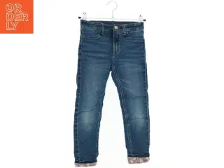 Skinnyfit lined jeans med blomstrede opslag fra H&M (str. 116)
