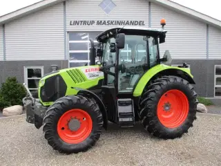 CLAAS ARION 550 C-matic med frontlift, affjedret foraksel og affjedret kabine.