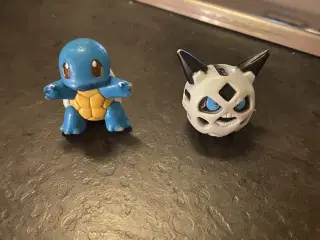 2 ældre pokemon figurer sælges.