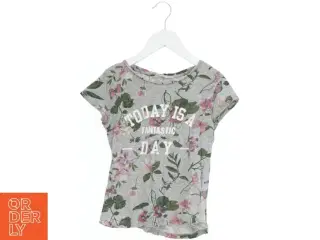 Bluse med blomsterprint fra H&M (str. 140)