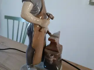 Smed en kgl. porcelænsfigur