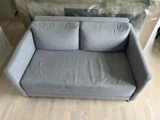 Dejlig sovesofa i lys grå