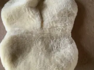 Siddeovertræk til saddel og ridedækken