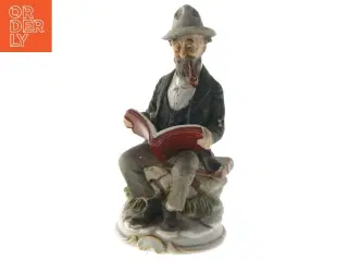Porcelænsfigur af læsende mand fra Kjellerup (str. 17 cm)