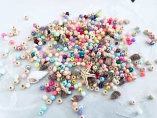 Blandet perler og små konkylier