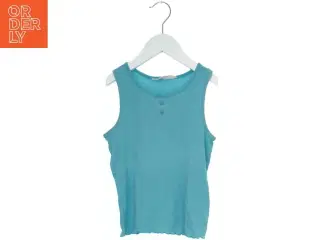 Tanktop i lyseblå fra H&M (str. 116)